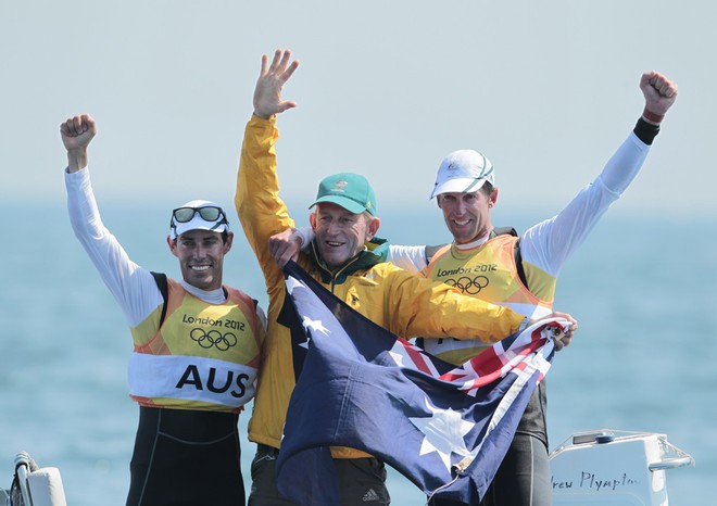 Mathew Belcher and Malcolm Page (AUS) who won the Gold Medal, with their coach, the legendary Victor Kovalenko &copy; onEdition http://www.onEdition.com